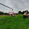 Family playing in the back yard