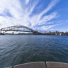 opera house at sunset with bridge and Sydney skyline