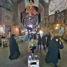 Seller under the portrait of the Ayatollah in the Bazaar at Esfahan - Iran