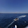 Divers heading for Batu Bolong Island or Current City