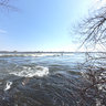 Surfing the St-Lawrence River at Habitat 67 in Montreal