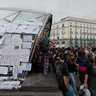 protest signs in the Puerta del Sol demonstration