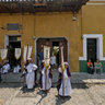 Waiting for a Procession during Holy Week in Angitua, Guatemala