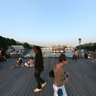 Evening gathering at the Pont Des Arts, Paris