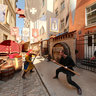At the street near medieval restaurant Rozengrāls in Old Riga