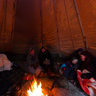 Sharing warmth at the Sami lavvu in Skansen, Stockholm